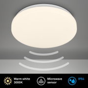 Ronde witte LED-plafondlamp met warm wit licht (3000K), geïntegreerde microgolfsensor en IP54-bescherming, afgebeeld van onderaf/vanuit de frontale onderzijde