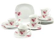 Weißes Porzellan-Kaffeeservice mit rosa Blütenmotiv, vier Tassen mit Untertassen und passenden Tellern, frontal in leichter Schrägansicht vor weißem Hintergrund.