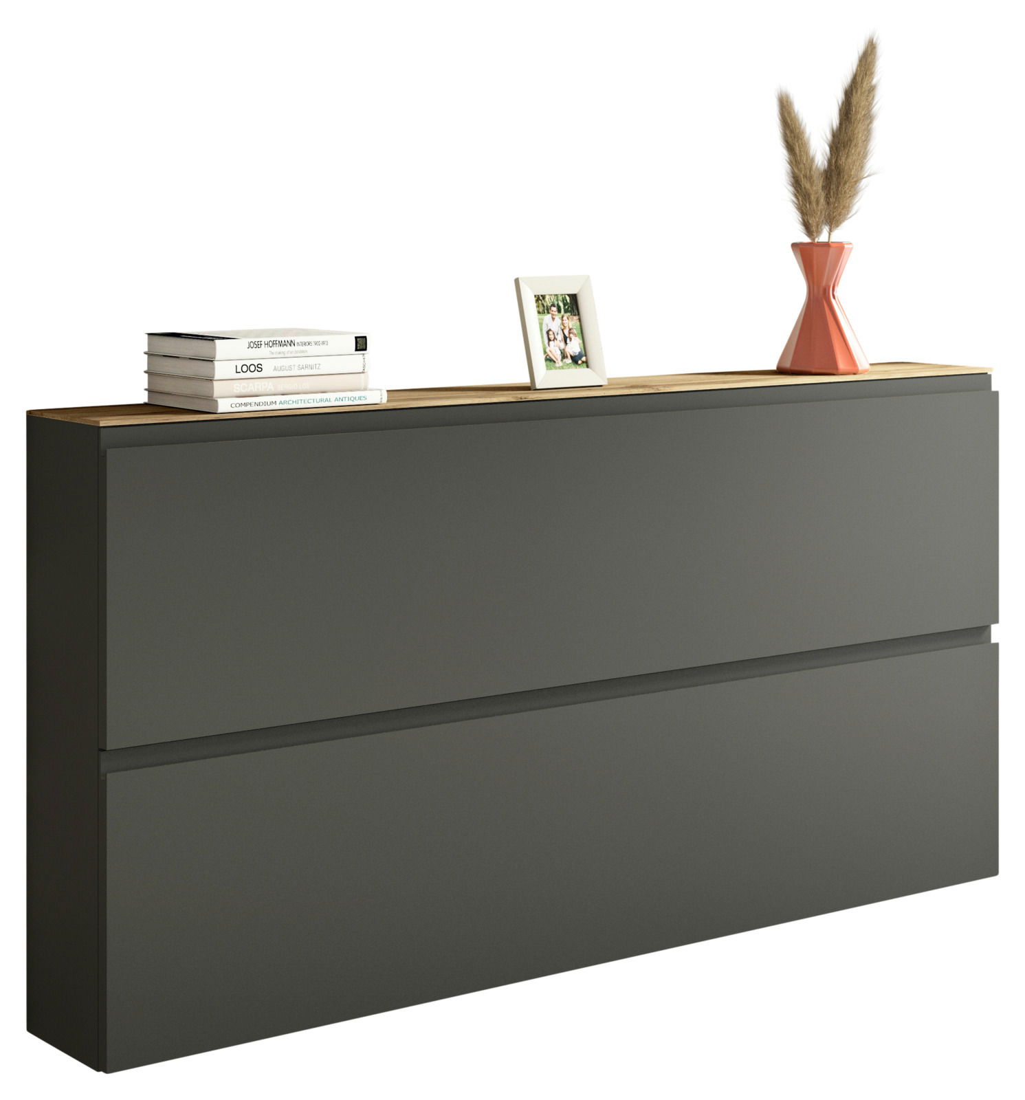 Moderner XL-Hängeschuhschrank in dunklem Grau mit zwei Klappen, dekoriert mit Büchern, einem Bilderrahmen und einer Vase mit Pampasgras, seitliche Perspektive.