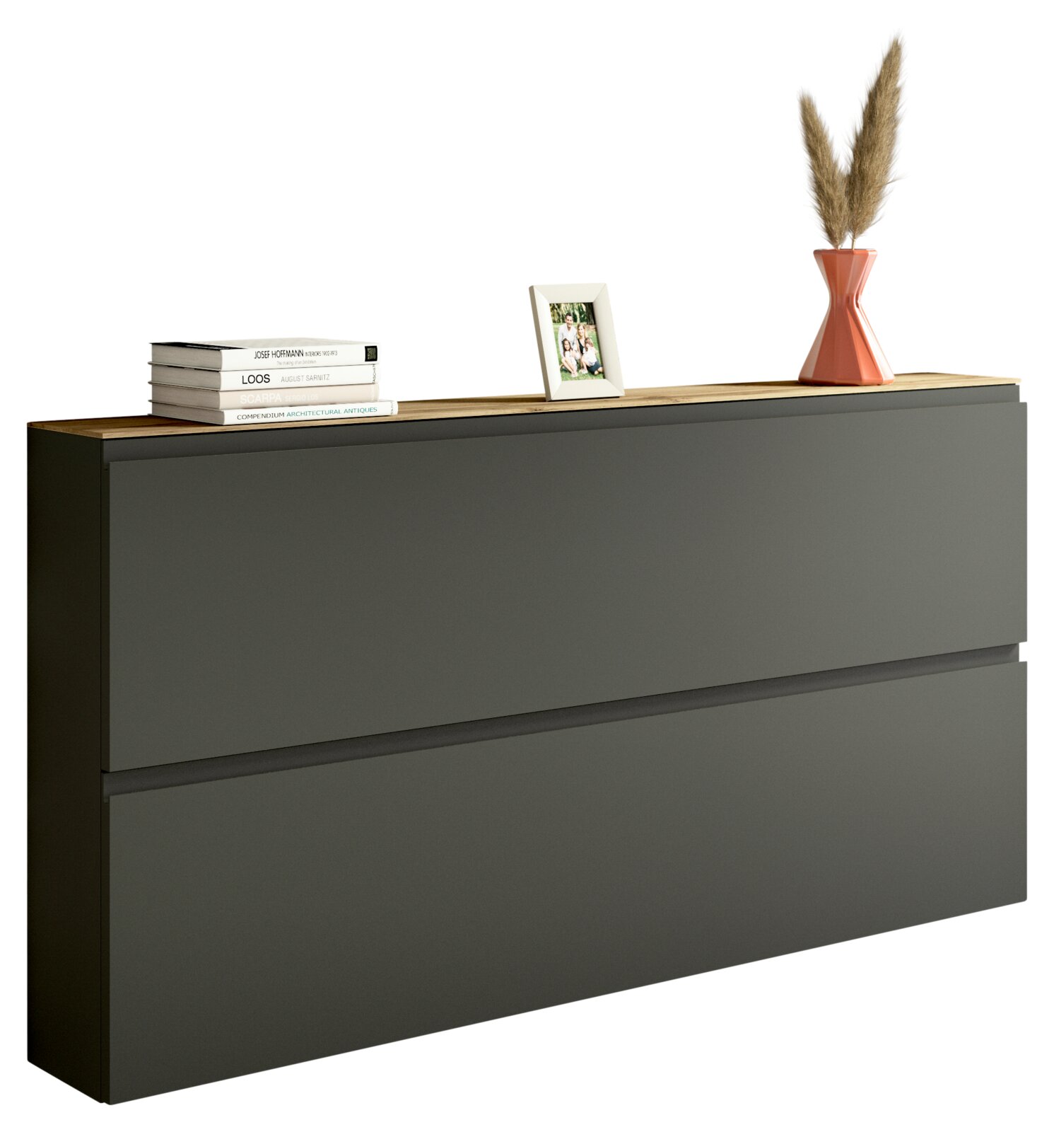 Moderner XL-Hängeschuhschrank in dunklem Grau mit zwei Klappen, dekoriert mit Büchern, einem Bilderrahmen und einer Vase mit Pampasgras, seitliche Perspektive.