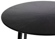 Runder schwarzer Esstisch FABIO aus Holz, Nahaufnahme der Tischplatte aus schräger Perspektive.