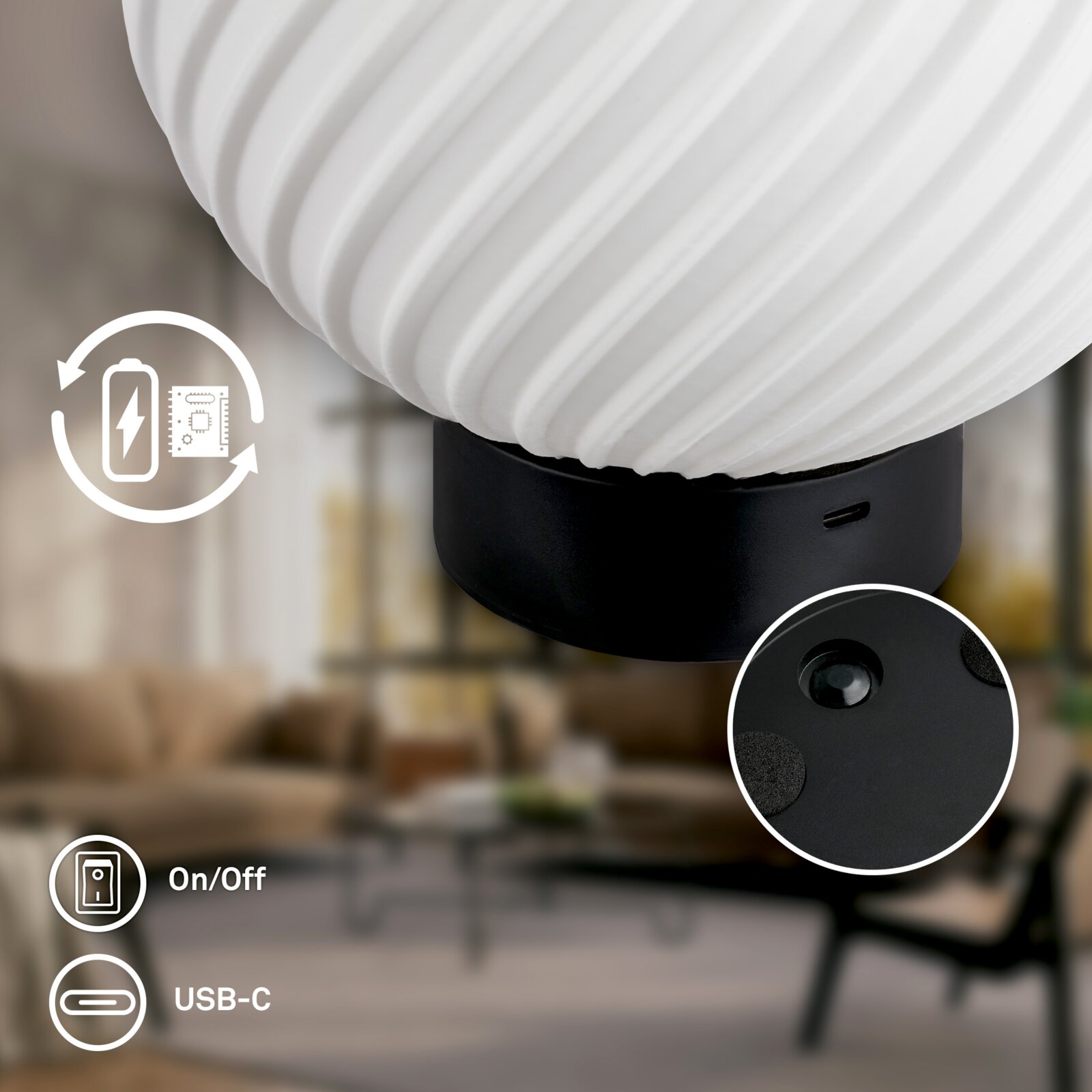 Nahaufnahme in seitlicher Perspektive: weiße, geriffelte LED-Tischlampe mit schwarzem Sockel, USB-C-Ladeanschluss und Ein-/Aus-Schalter, Detailansicht der Unterseite mit Standfüßen