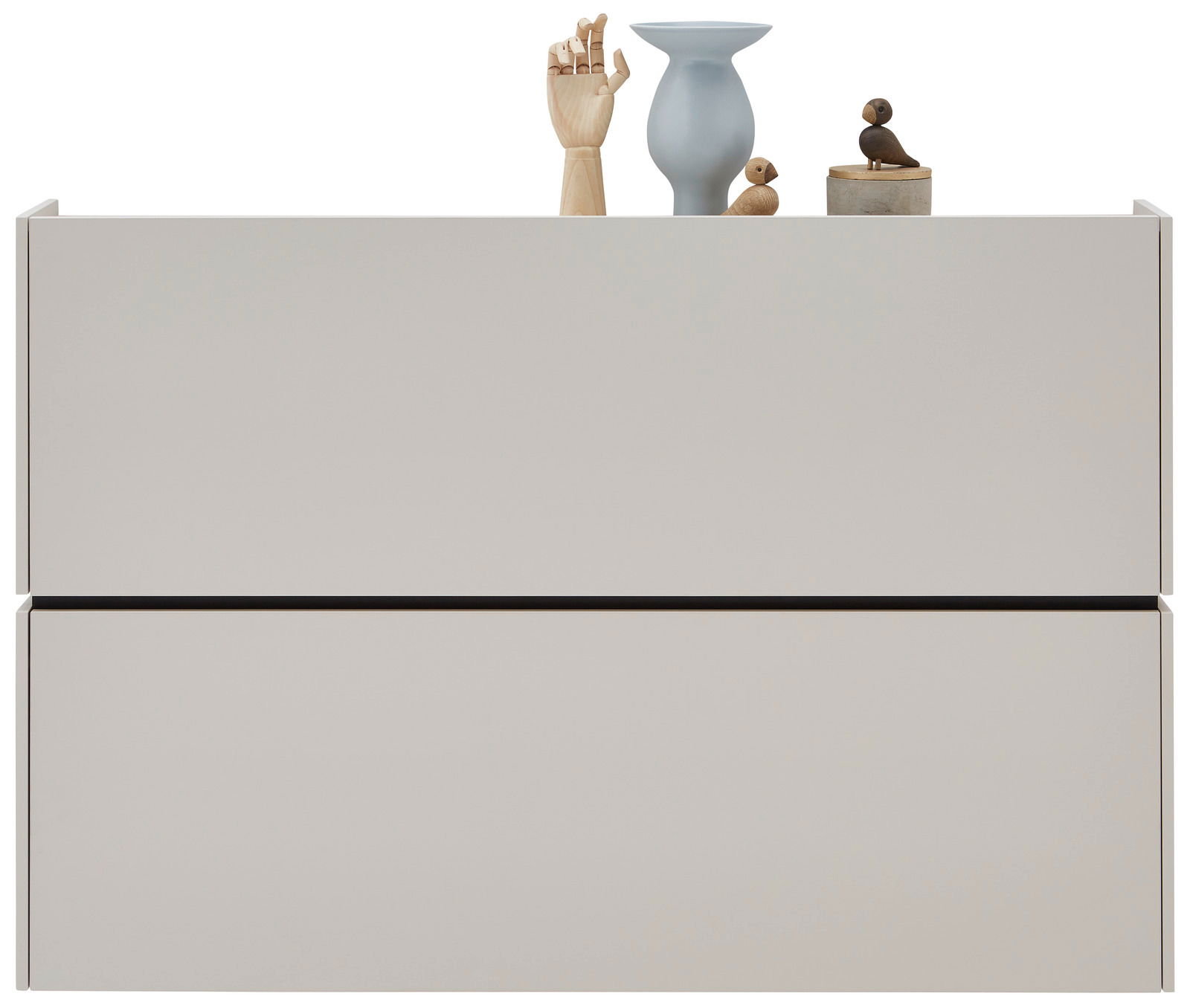 Moderner Hängeschuhschrank in minimalistischem Design, frontal abgebildet, mit Dekorationen auf der Oberseite.