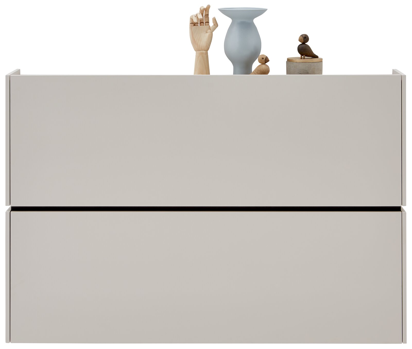 Moderner Hängeschuhschrank in minimalistischem Design, frontal abgebildet, mit Dekorationen auf der Oberseite.