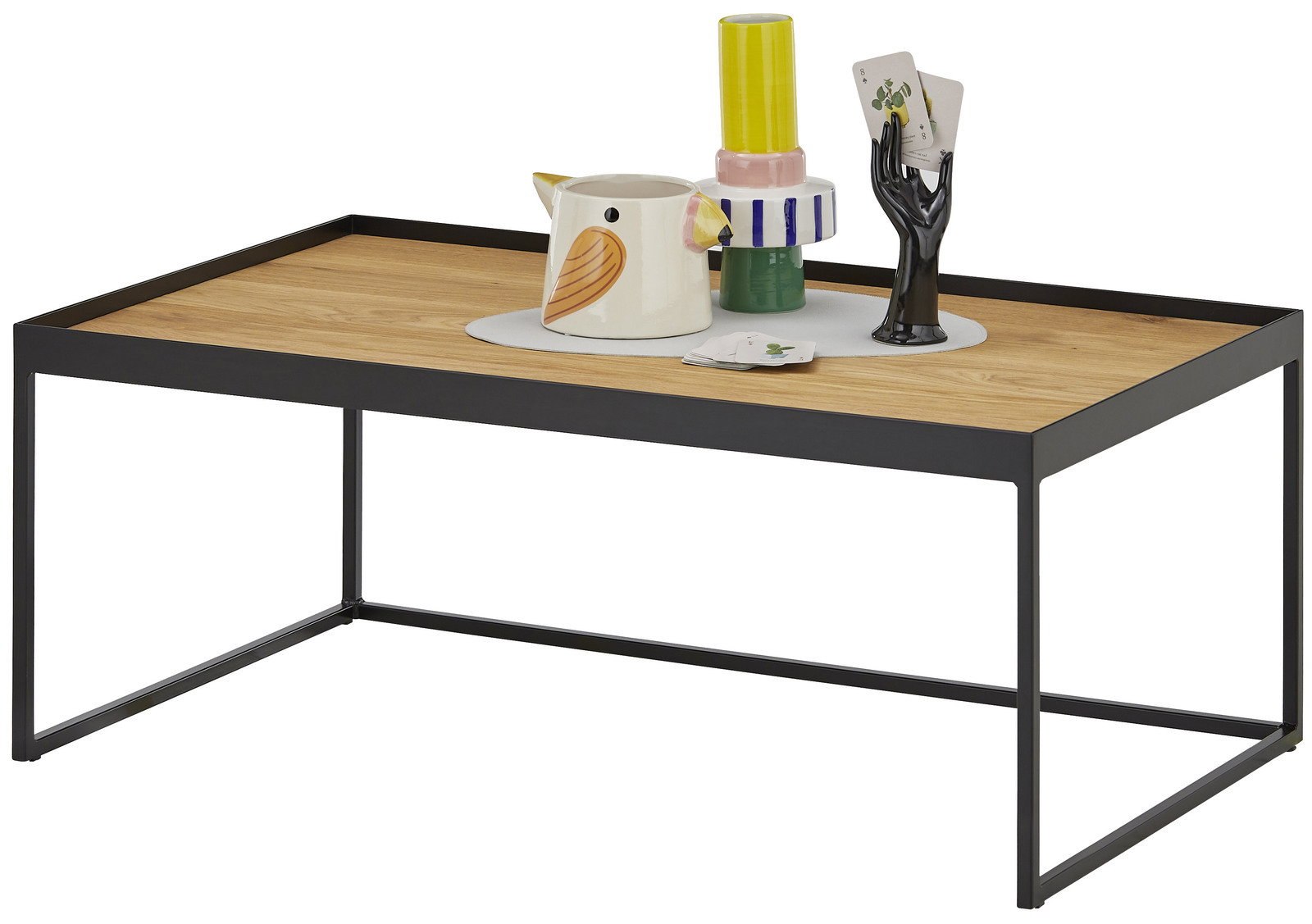 Moderner Beistelltisch mit schwarzem Metallrahmen und Holzplatte, dekoriert mit Keramik und Kartenhalter, seitliche Perspektive.