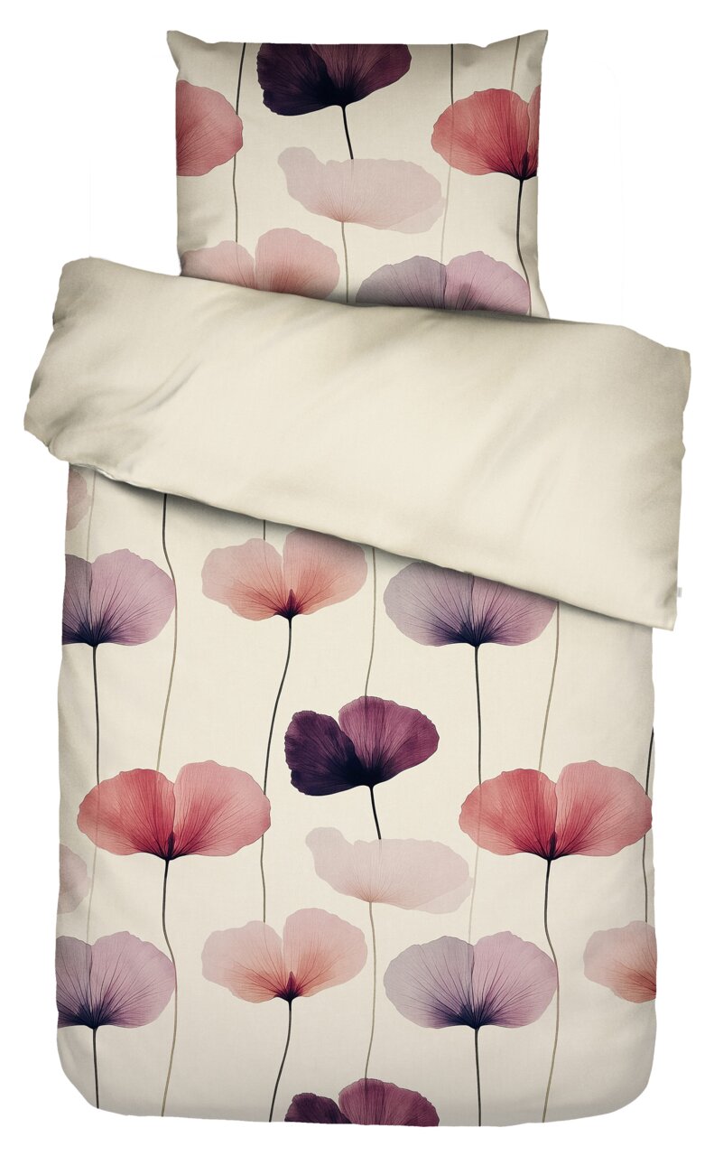 Beddengoedset met bloemmotief in roze, paarse en koraaltinten op een lichte achtergrond, met een effen lichtgekleurde deken, bovenaanzicht