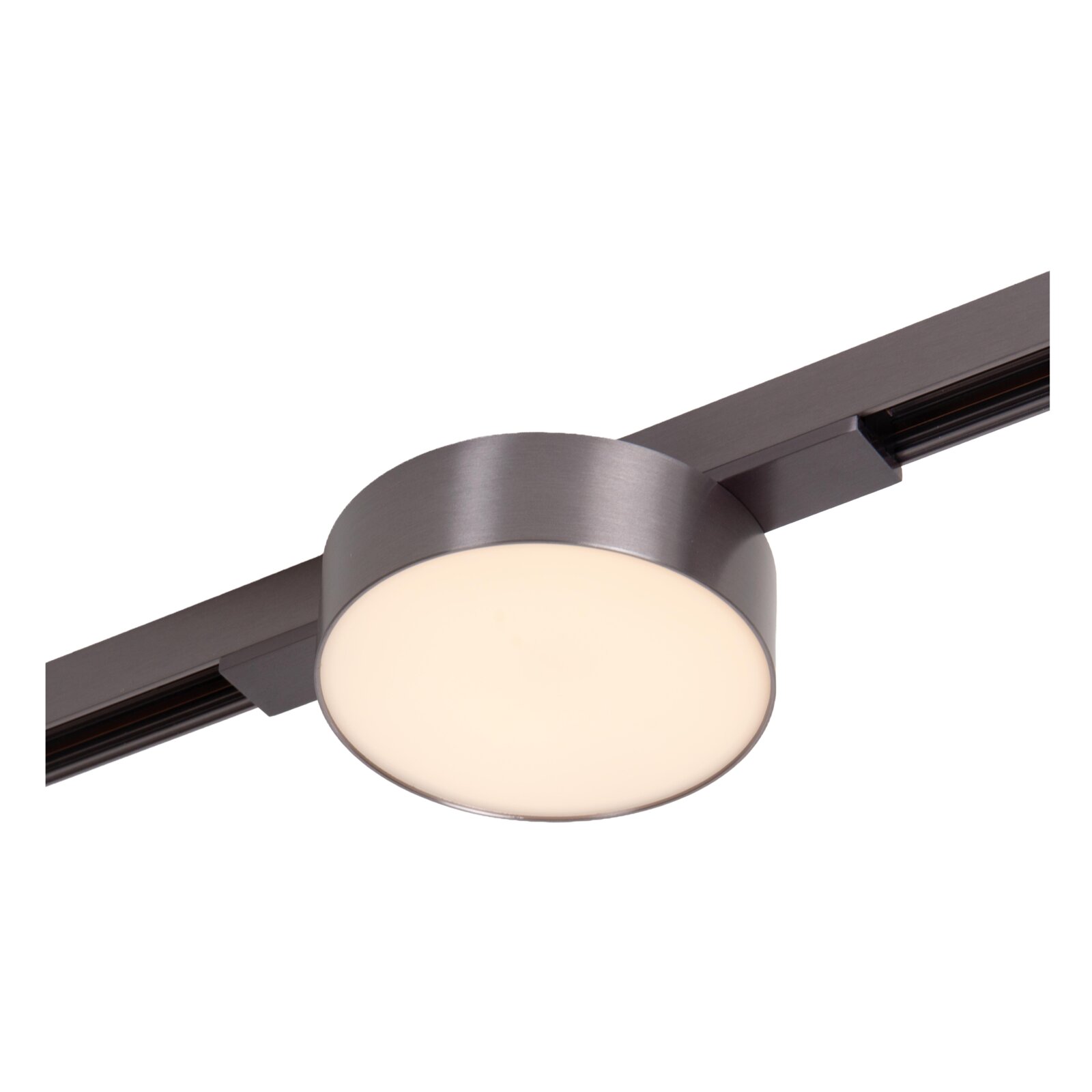 Ronde LED railspot in matzwart op spanningsrail, close-up schuin van onderen gezien