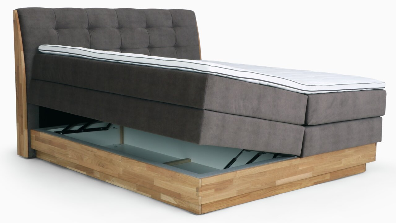Boxspringbett mit Stauraum, seitliche Perspektive, grauer Stoffbezug, Holzrahmen