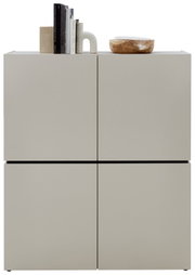 Voleo Highboard UNIQUE in moderner, minimalistischer Frontansicht mit Dekorationen auf der Oberseite.