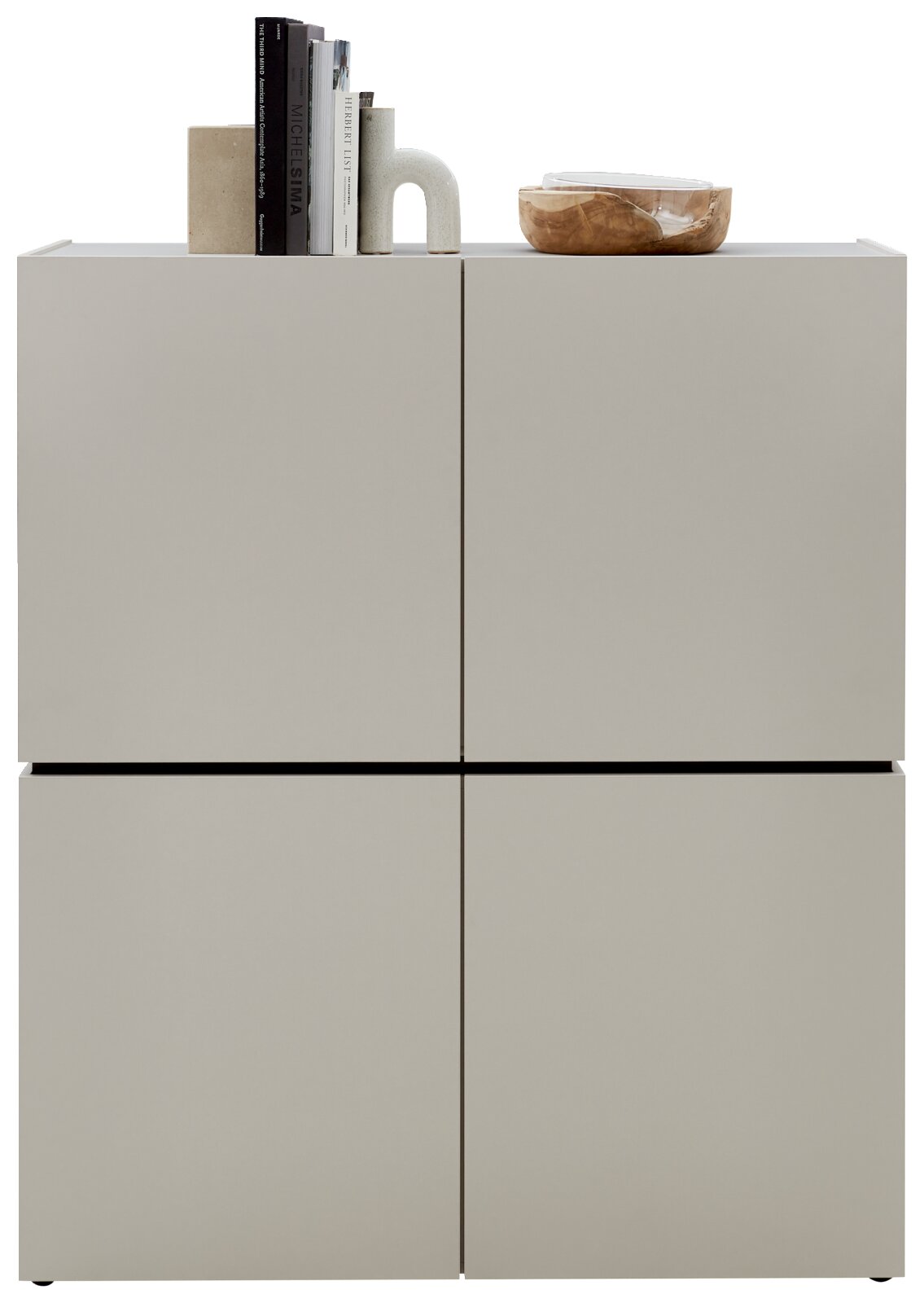 Voleo Highboard UNIQUE in een modern, minimalistisch ontwerp met decoraties aan de bovenkant.