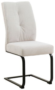 Moderner Schwingstuhl ARNE mit cremefarbenem, geripptem Stoffbezug und schwarzem Metallgestell, seitliche Perspektive.