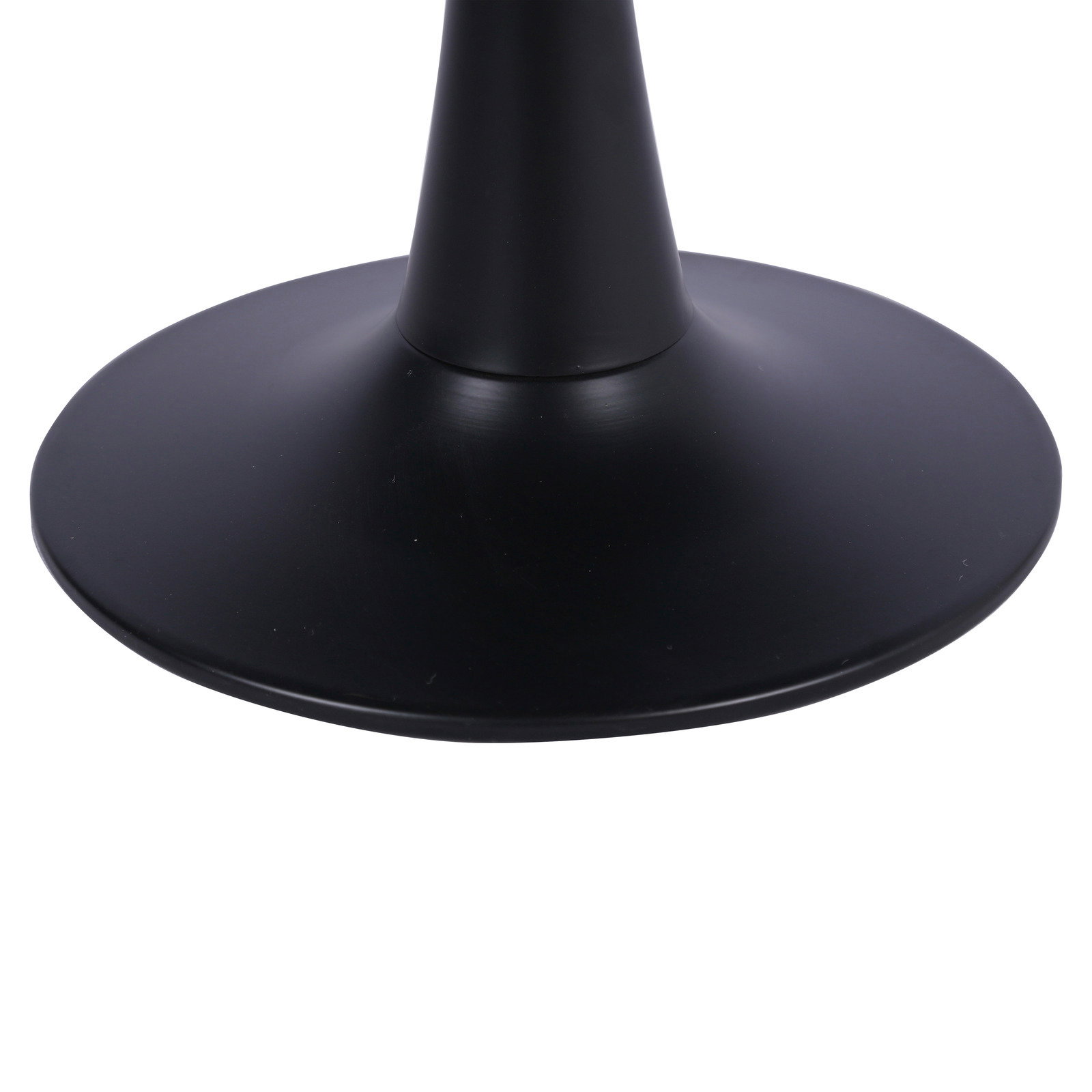 Schwarzer, runder Sockel eines Couchtisches aus seitlicher Perspektive