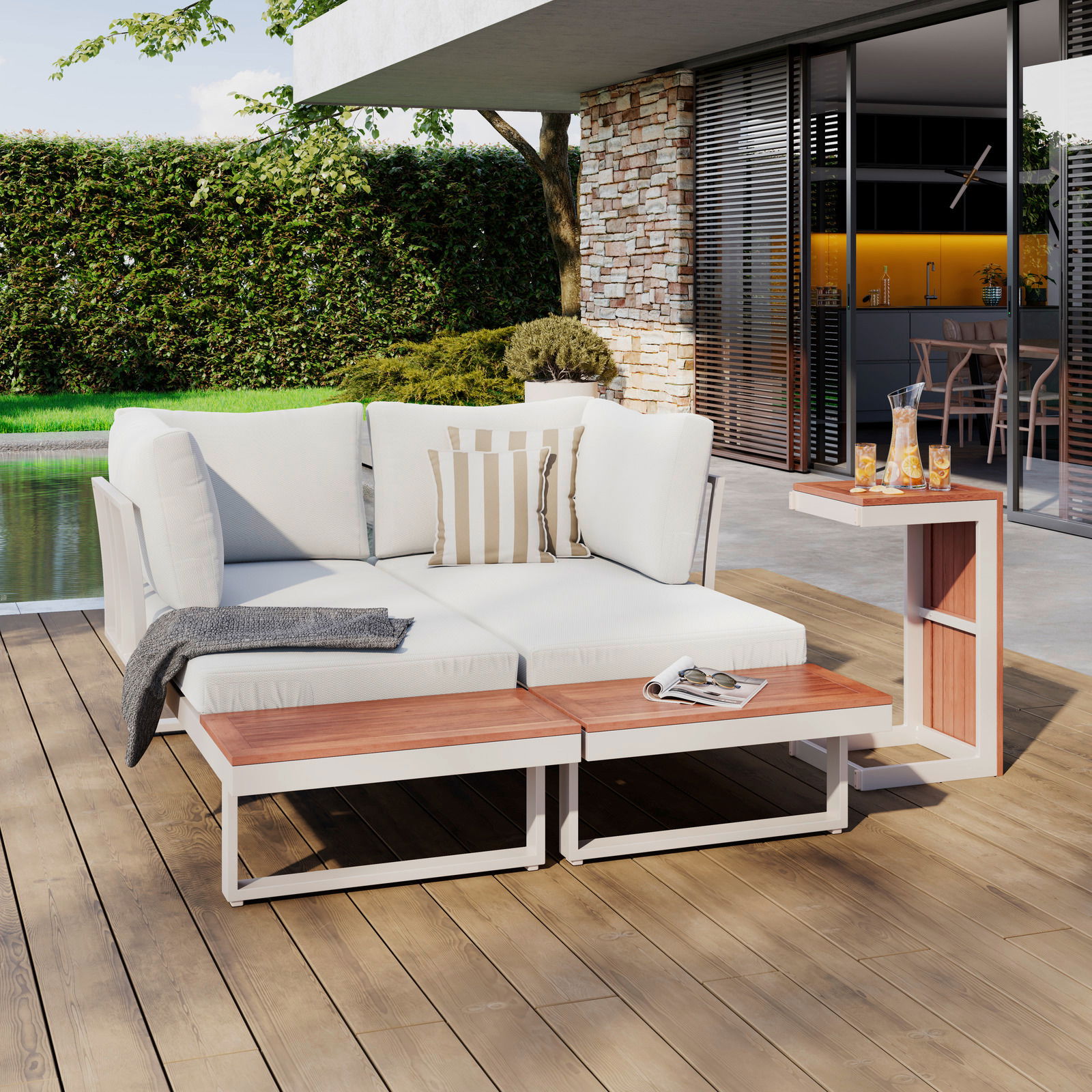 Moderne Gartenlounge mit weißem Polster und Holztisch, seitliche Perspektive, auf einer Terrasse mit Blick auf den Garten.