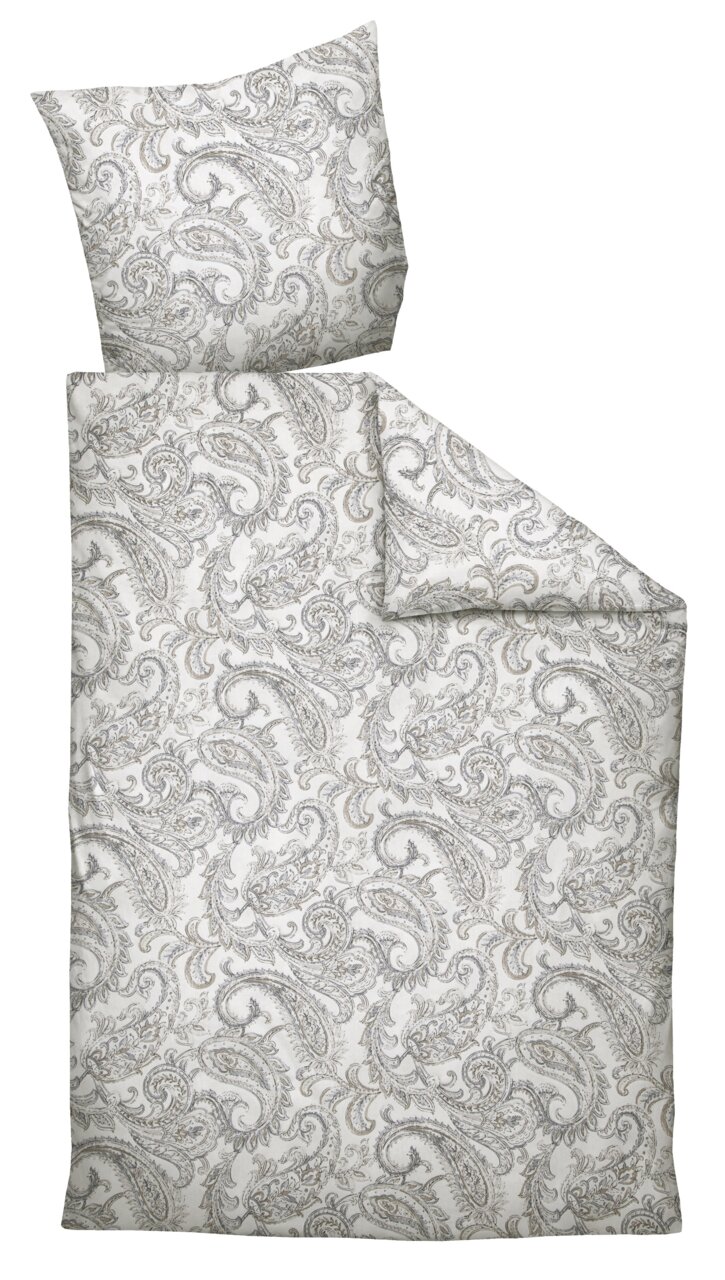 Bettwäsche-Set mit Paisley-Muster in Grau und Weiß, bestehend aus einem Kissenbezug und einem Bettdeckenbezug, aus der Vogelperspektive fotografiert.