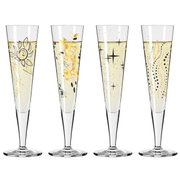 Vier elegante champagneglazen met gouden en zwarte versieringen, van voren afgebeeld.