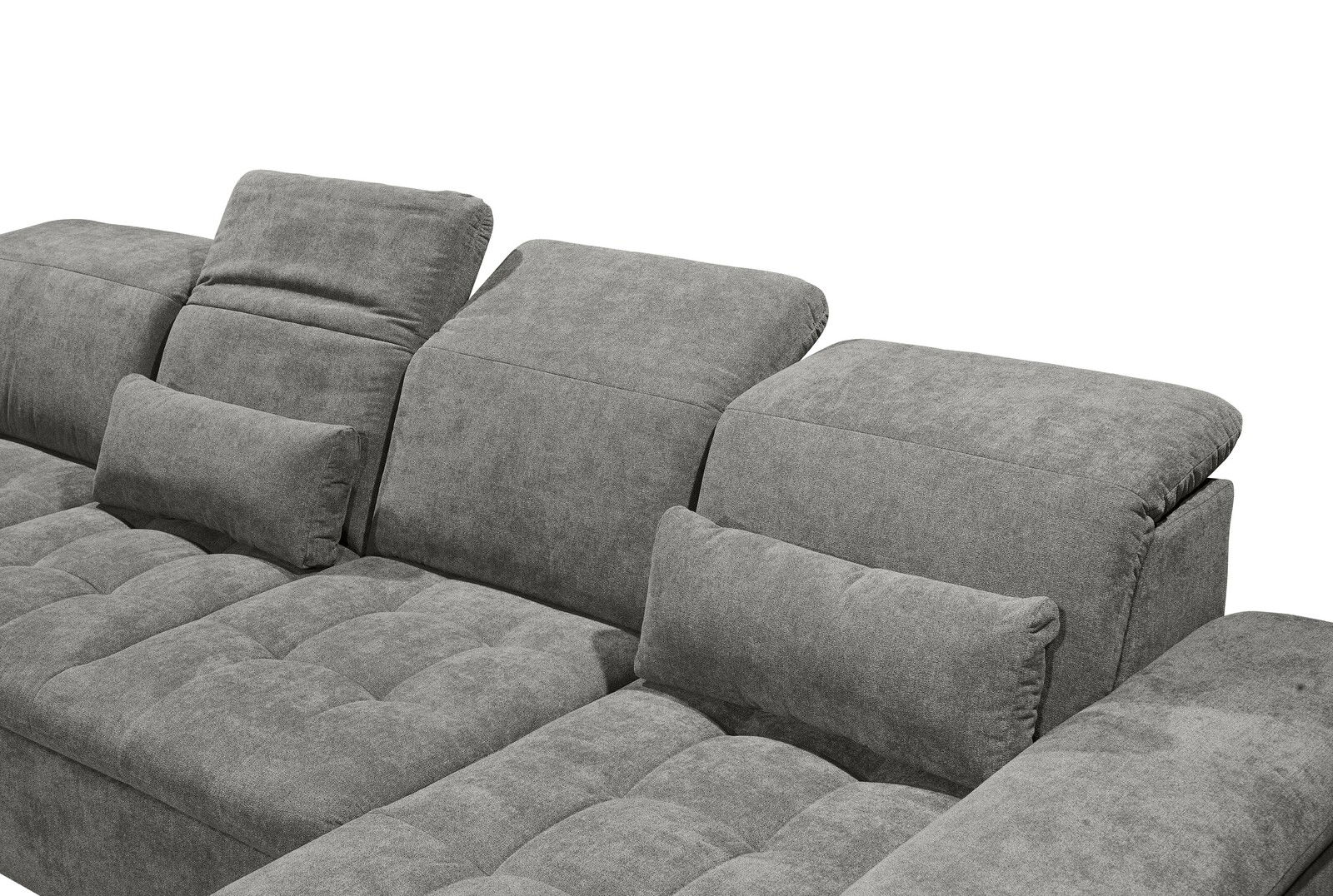 Graues Sofa mit verstellbaren Kopfstützen und Kissen, seitliche Perspektive