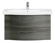 Frontansicht eines modernen Waschtischs mit grauer Holzoptik und zwei Schubladen, ausgestattet mit einem weißen Waschbecken und einem Chrom-Wasserhahn.