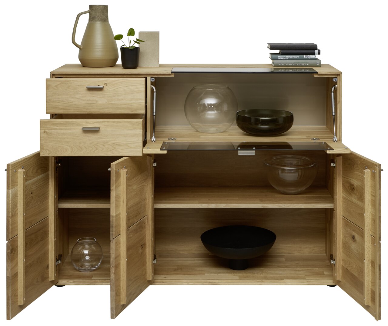 Valnatura Hoog dressoir VENTURO Hoogwaardig houten hoogkast met open voorkant, waarin lades, planken en decoratieve voorwerpen te zien zijn.
