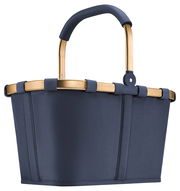 Moderner Einkaufskorb in Dunkelblau mit stabilem Griff, seitliche Perspektive