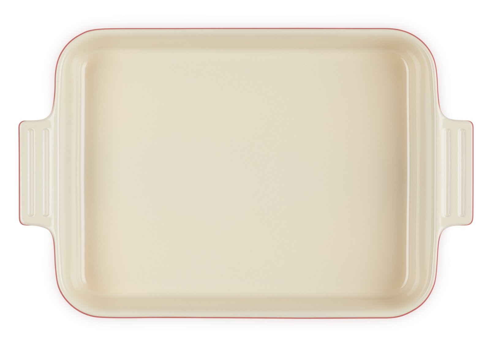 Een rechthoekige ovenschaal in kersenrood met een crèmekleurige binnenkant en handvatten aan de zijkanten.