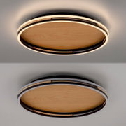 Runde LED-Deckenleuchte mit Holzoptik-Innenfläche und schwarzem Ring, umlaufender Lichtkranz, Ansicht von unten an der Decke