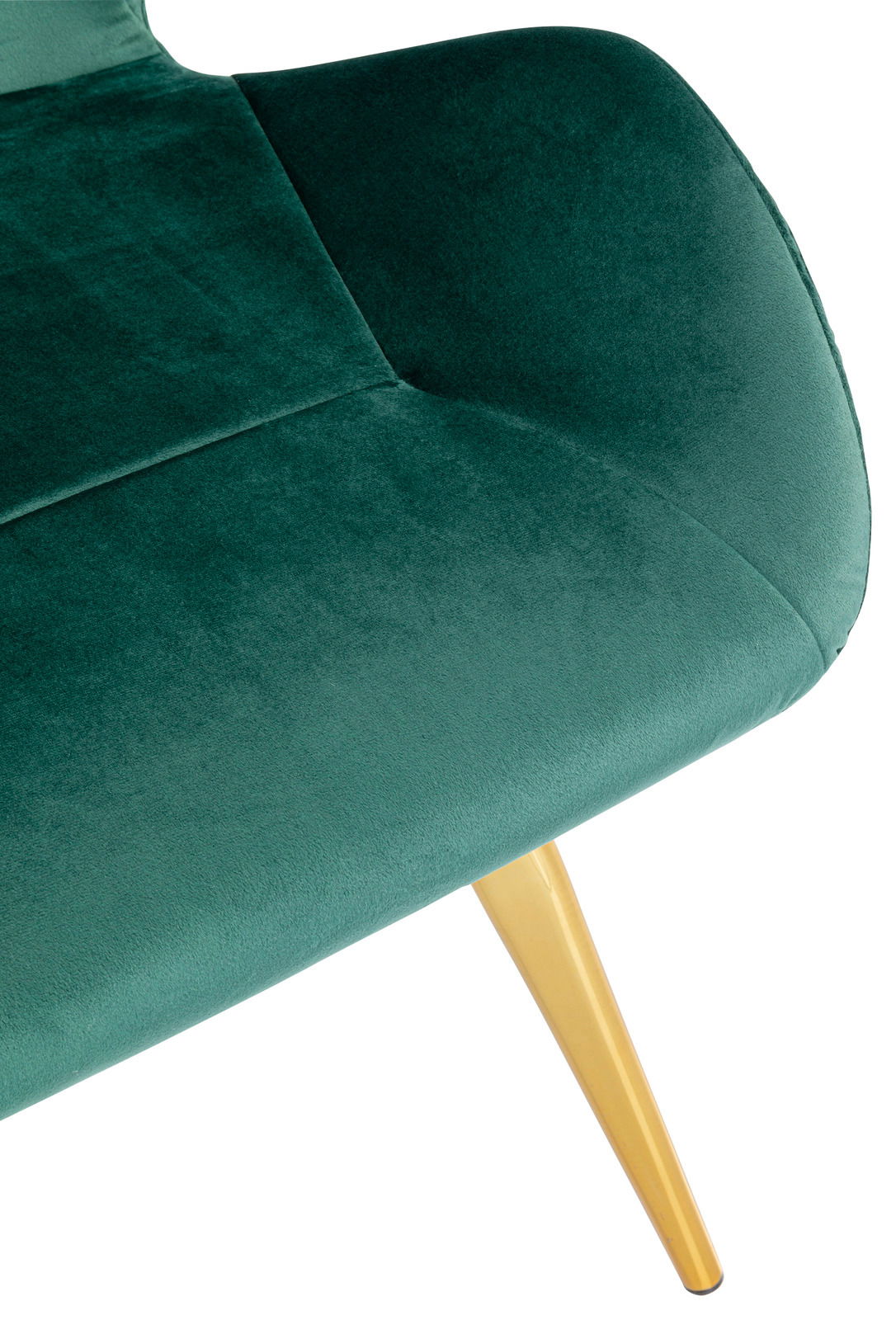 Nahaufnahme eines grünen Stuhls mit samtiger Oberfläche und einem goldenen Bein, Perspektive von oben.