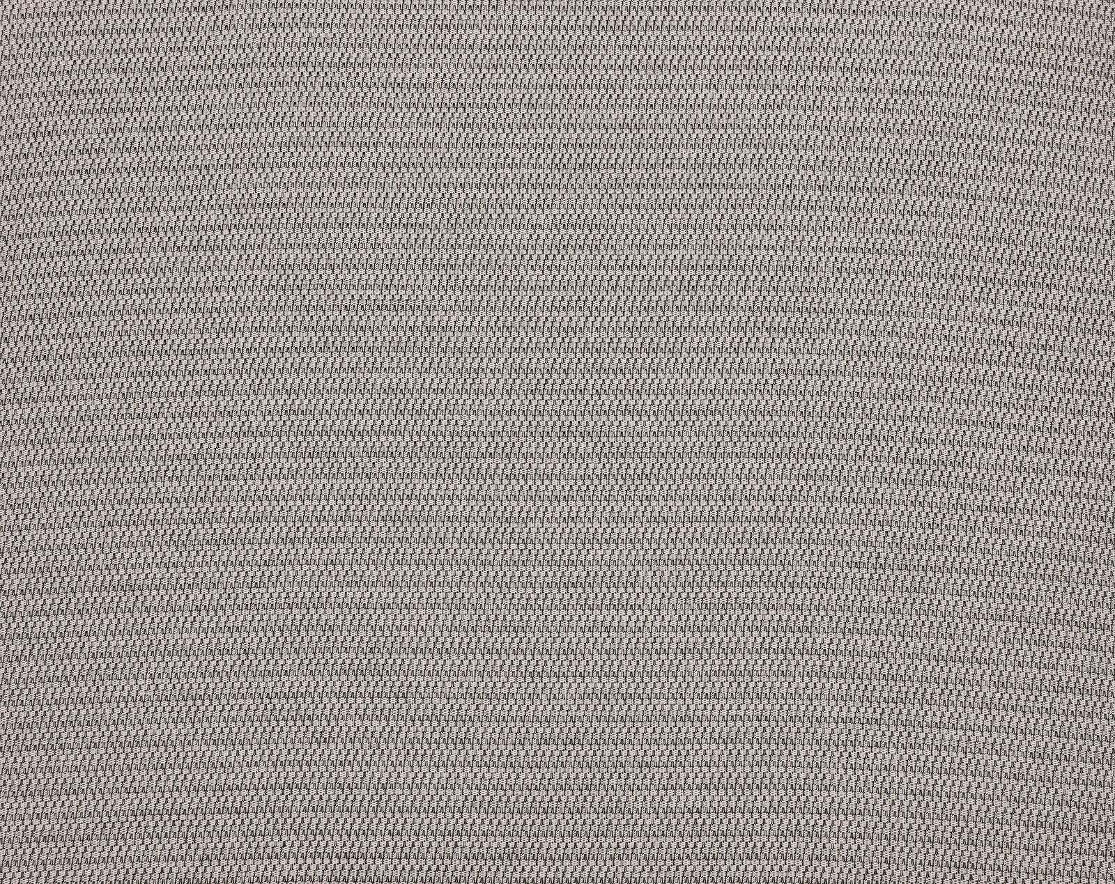 Nahaufnahme einer grauen, strukturierten Stoffoberfläche, von oben betrachtet.