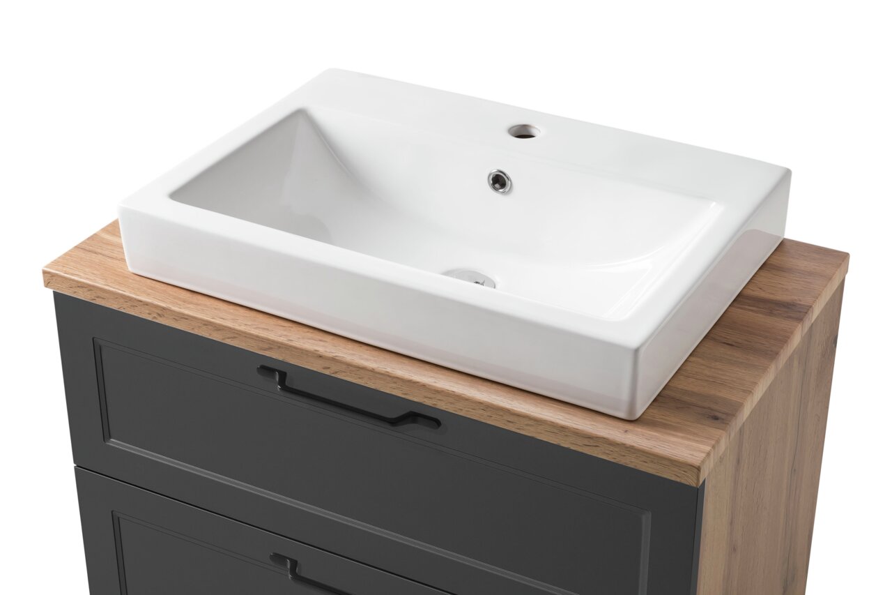 Moderner Waschtisch mit weißem Keramikbecken und Holzoberfläche, Perspektive von schräg oben