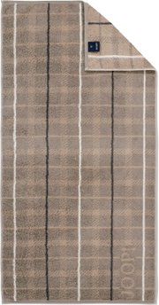 Joop Handtuch in Taupe mit Streifenmuster in Weiß und Dunkelgrau, mit umgeschlagener Ecke und sichtbarem Logo-Label, Draufsicht von oben