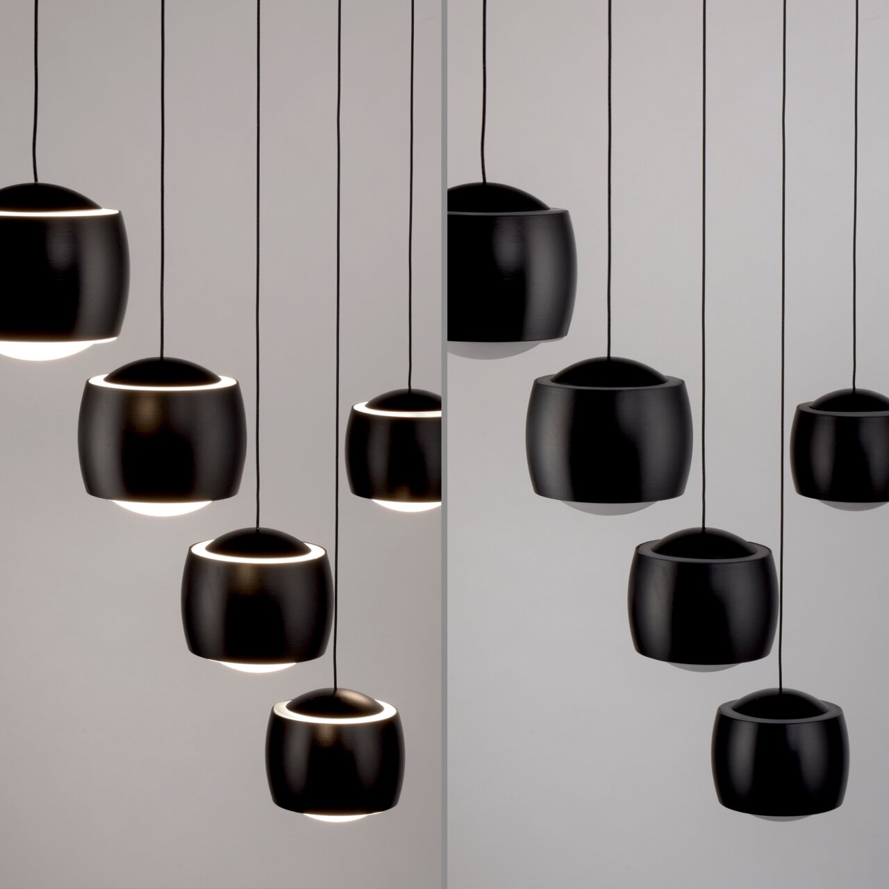 Moderne schwarze Pendelleuchte BALLINI in seitlicher Perspektive, bestehend aus mehreren kugelförmigen Lampenschirmen, die von der Decke hängen.