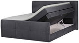 Boxspringbett 160 in dunklem Stoff mit geöffneter Bettkastenfunktion, seitliche Perspektive