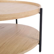 Moderner Couchtisch mit zwei runden Holzplatten und schwarzen Metallbeinen, seitliche Perspektive