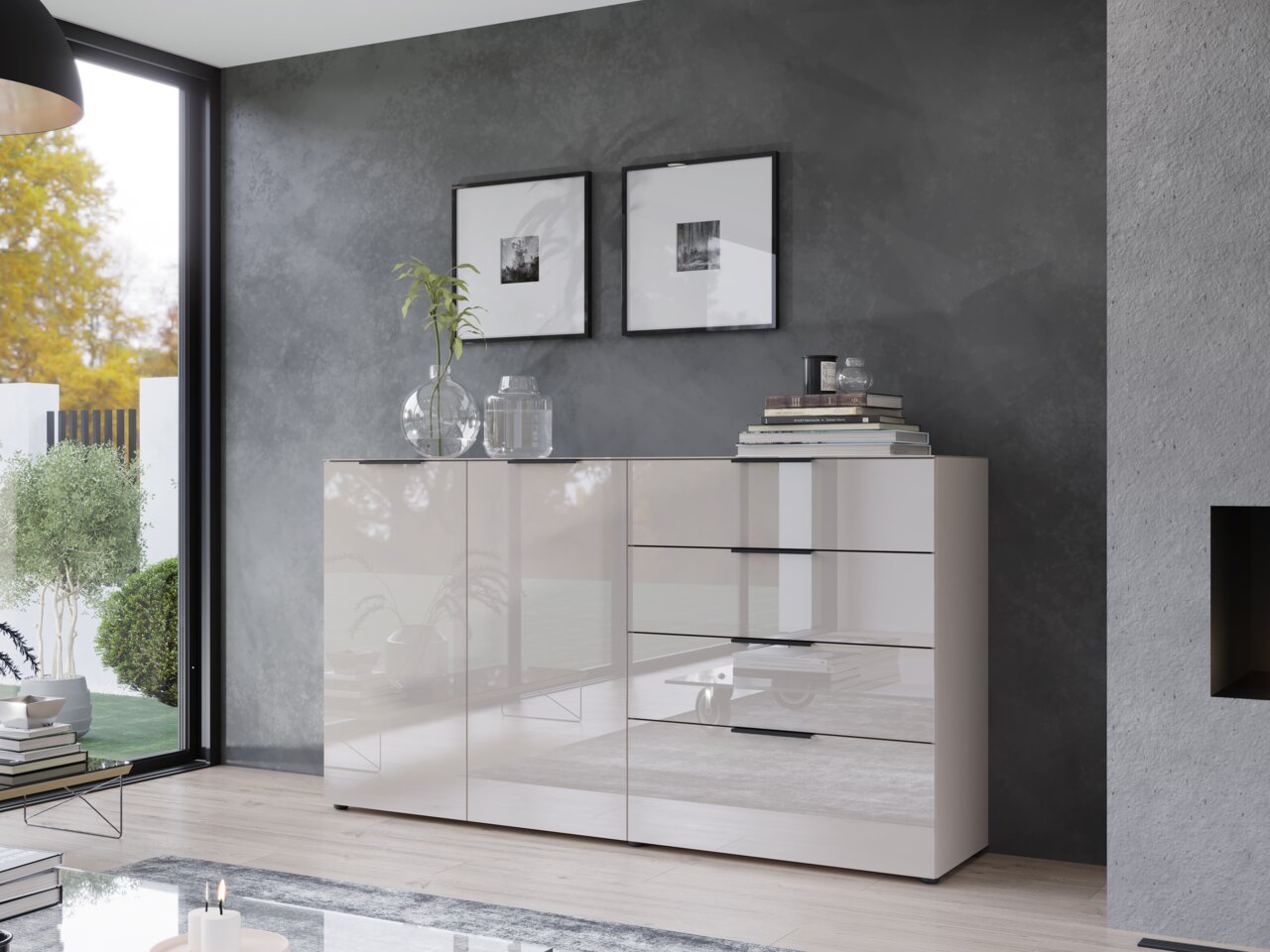 Novel XL-dressoir OAKLAND Moderne Schubkastenkommode in einem eleganten Wohnzimmer, seitliche Perspektive, mit Dekorationen und Büchern auf der Oberfläche.