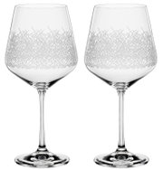 Twee elegante cocktailglazen met een fijn, kriskras patroon, gezien vanaf de zijkant.