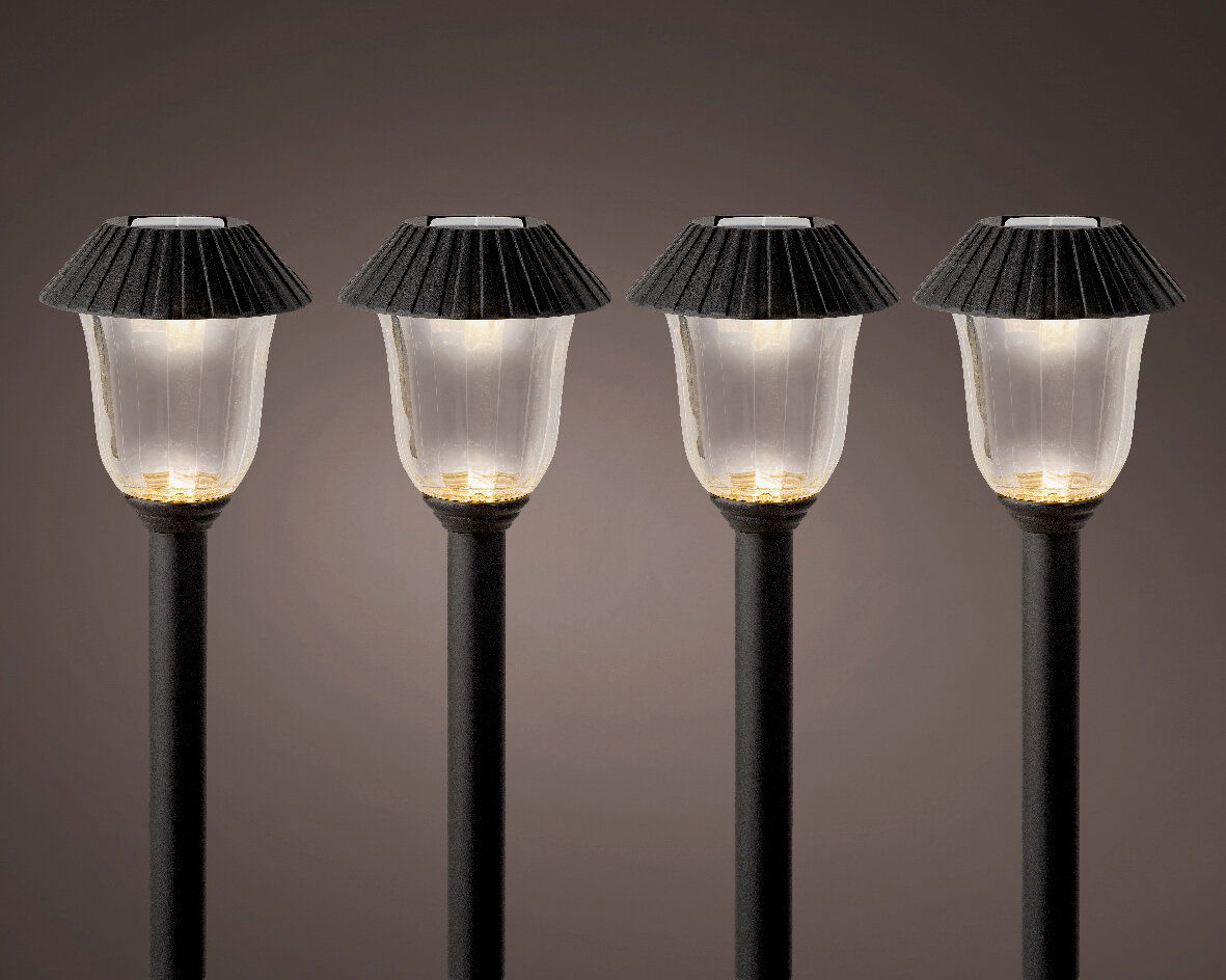 Vier Solar Stabbeleuchten in einer frontalen Ansicht, mit schwarzem Schirm und leuchtendem Licht.