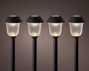 Vier Solar Stabbeleuchten in einer frontalen Ansicht, mit schwarzem Schirm und leuchtendem Licht.