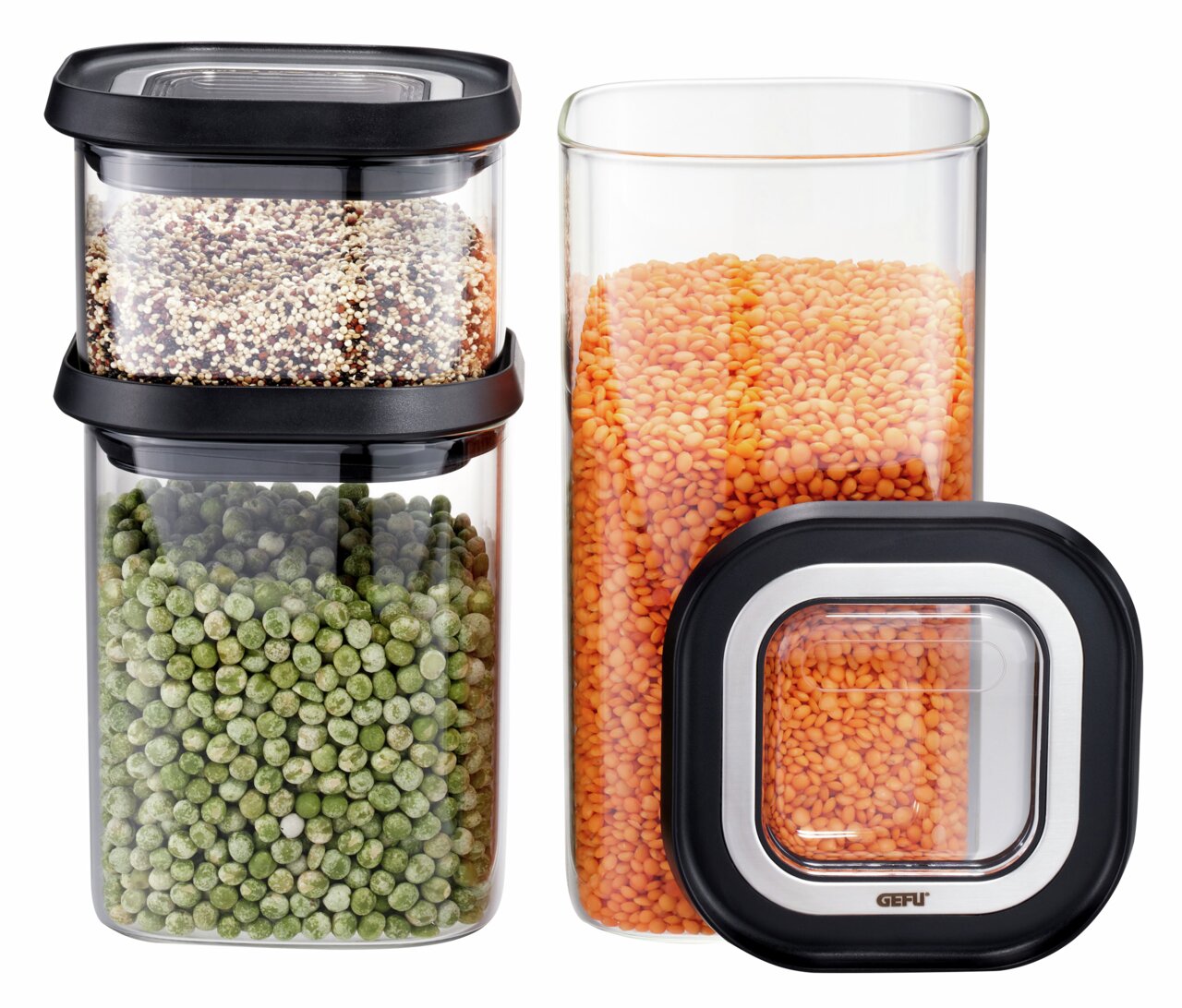 Vorratsdosenset aus Glas, bestehend aus drei Teilen mit schwarzen Deckeln, gefüllt mit Linsen, Erbsen und Quinoa, frontal abgebildet.