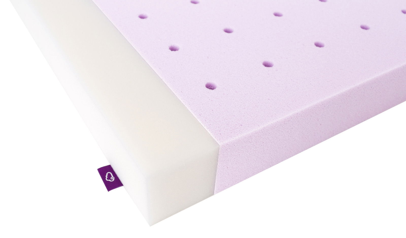 Träumeland Matratze 70x140 SILBERMOND Nahaufnahme einer Matratze 70x140 cm mit lila Schaumstoffoberfläche und weißen Seiten, perspektivisch von der Ecke aufgenommen.