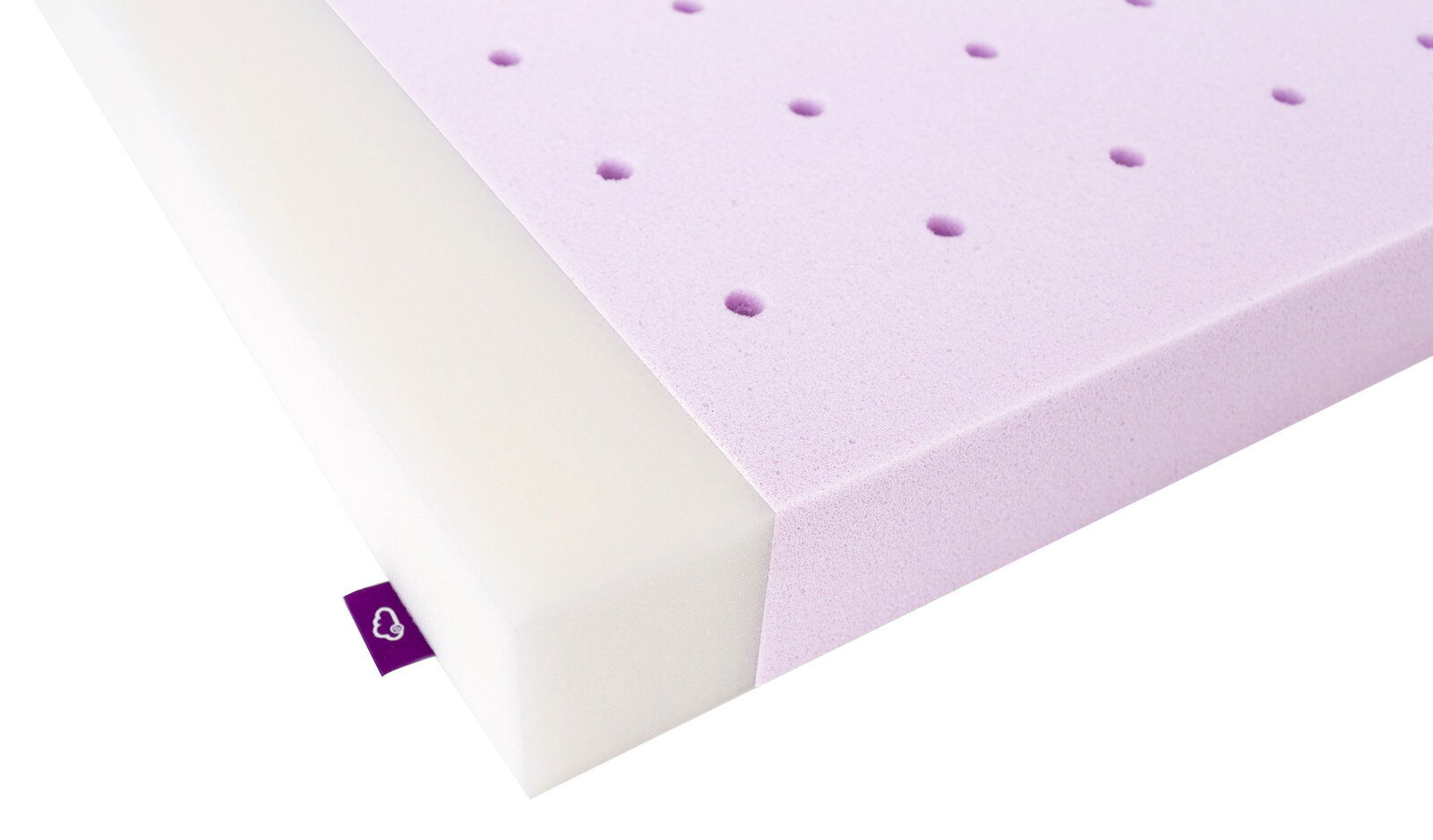 Träumeland Matratze 70x140 SILBERMOND Nahaufnahme einer Matratze 70x140 cm mit lila Schaumstoffoberfläche und weißen Seiten, perspektivisch von der Ecke aufgenommen.
