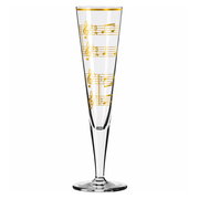 Champagnerglas mit goldenen Notenlinien, seitliche Perspektive