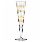 Champagnerglas mit goldenen Notenlinien, seitliche Perspektive