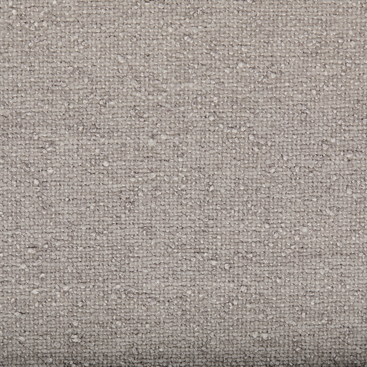 Nahaufnahme eines grauen, strukturierten Stoffes, der für ein Boxbett verwendet wird.