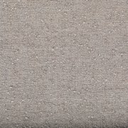 Nahaufnahme eines grauen, strukturierten Stoffes, der für ein Boxbett verwendet wird.