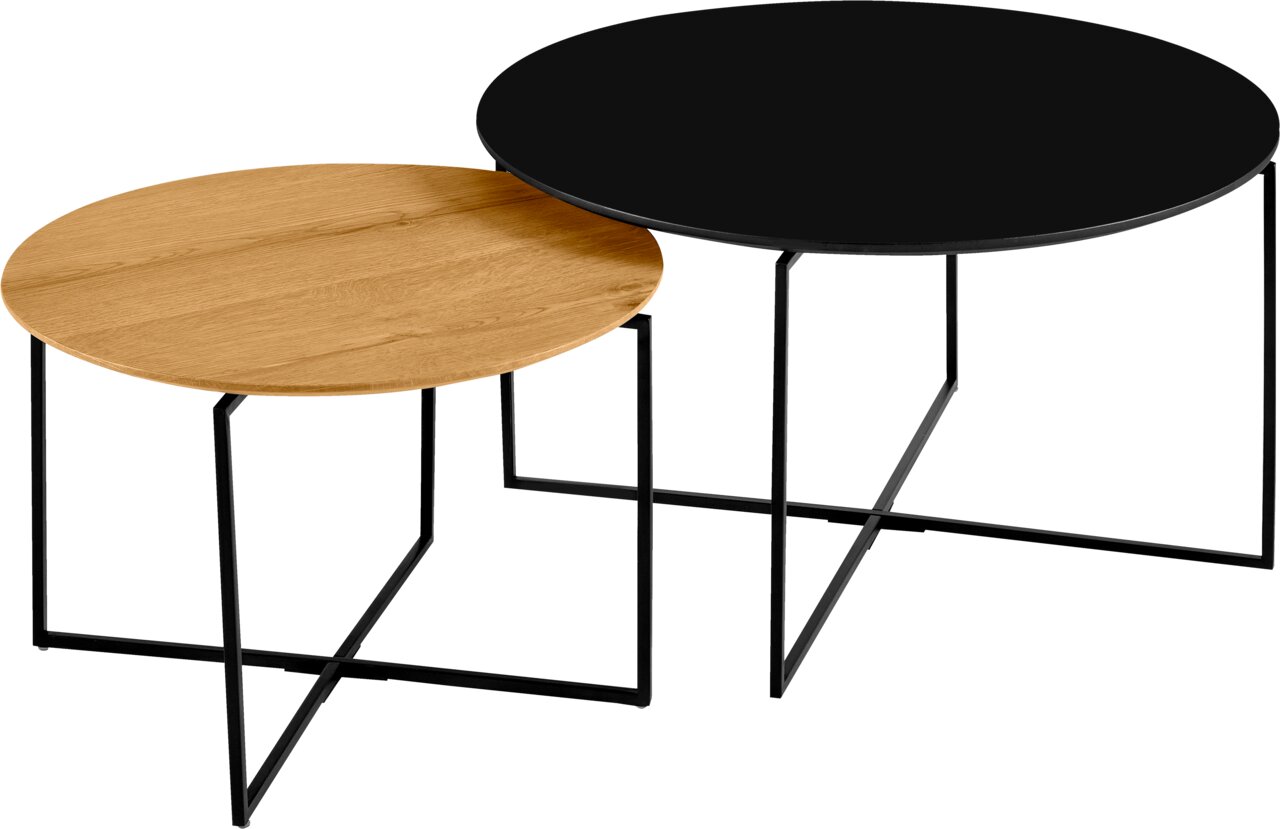 Zwei runde Couchtische im Set, einer mit schwarzer Tischplatte und der andere mit Holzoptik, aus seitlicher Perspektive.