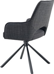 Dunkelgrauer, gepolsterter Polsterstuhl mit Armlehnen und schwarzem Metall-Spidergestell, Seitenansicht von links vor weißem Hintergrund