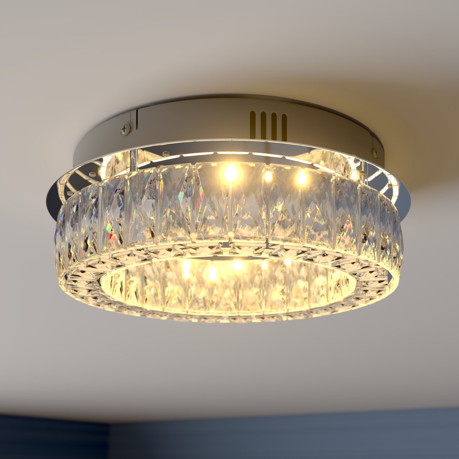 Runde LED-Deckenleuchte mit klarem Kristall-/Glasbehang und warmweißem Licht, Nahaufnahme von unten in leichter Untersicht