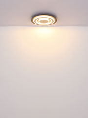 Moderne Deckenleuchte mit kreisförmigem Design, von unten betrachtet.