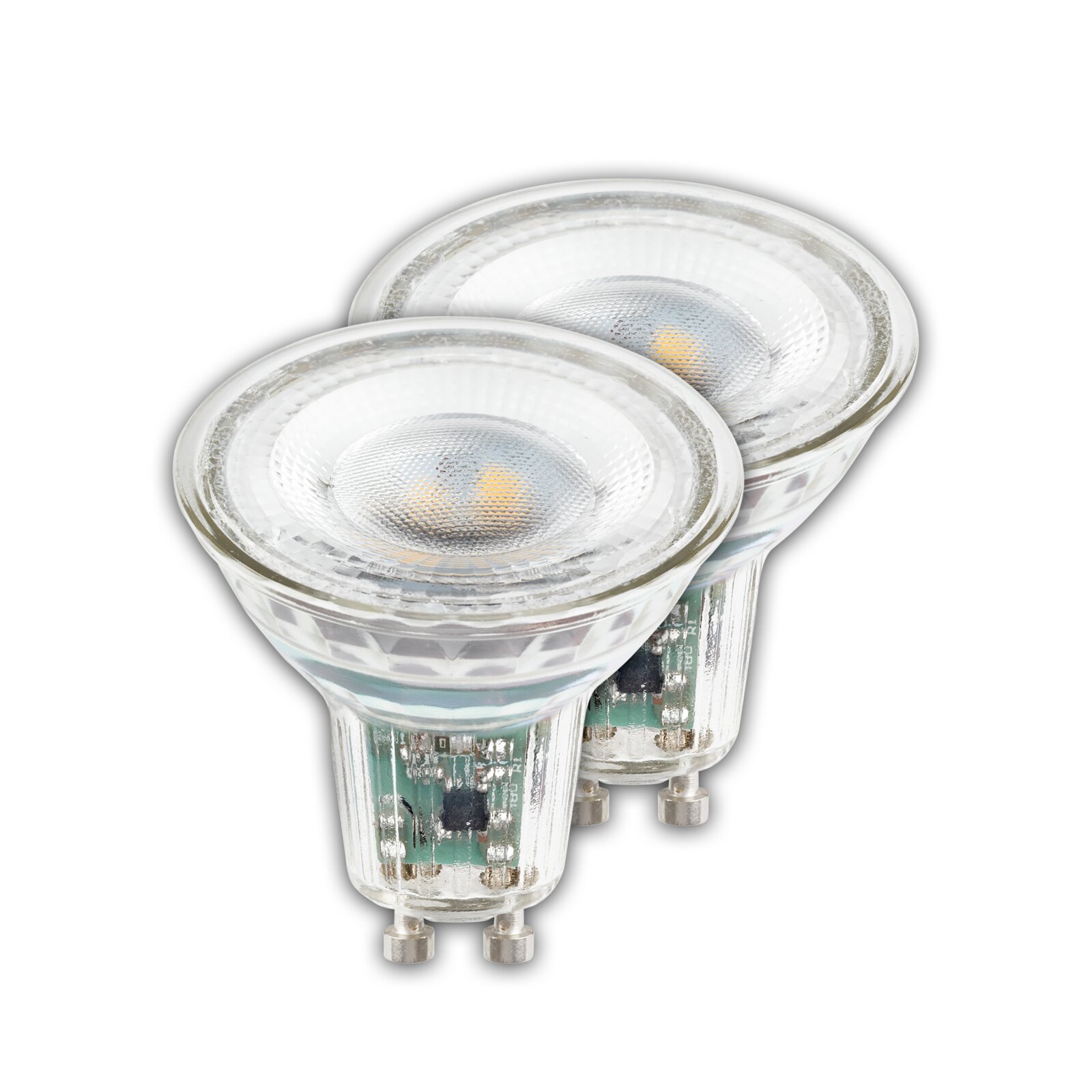 Een set van twee GU10-ledlampen, gefotografeerd vanuit een schuine hoek van bovenaf