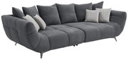 Großes, modernes Sofa in Dunkelgrau mit mehreren Kissen, seitliche Perspektive