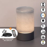 Akku-Windlicht und Tischleuchte mit zylindrischem Design, inklusive Fernbedienung und Ladeplatte, seitliche Ansicht.